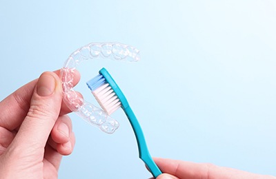 brushing Invisalign tray 