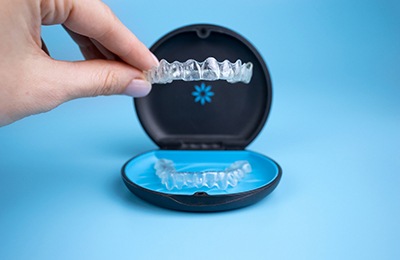 man visiting orthodontist for Invisalign 