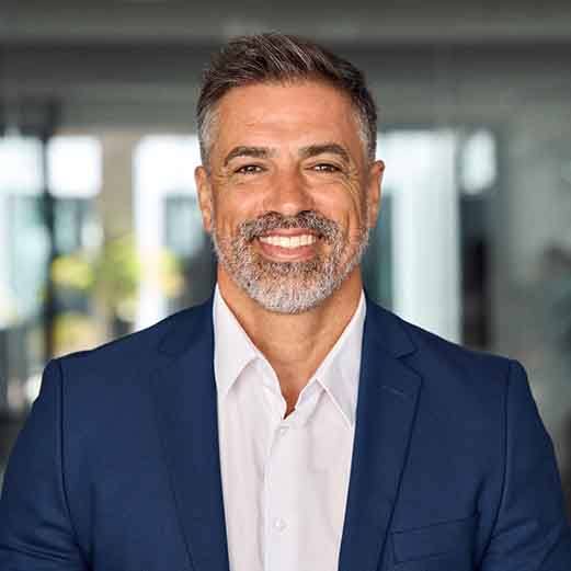 Male executive smiling with veneers 